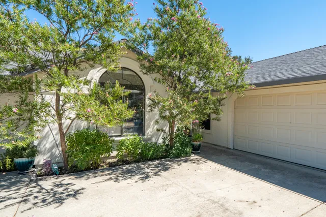 a backyard of a house with lots of green space