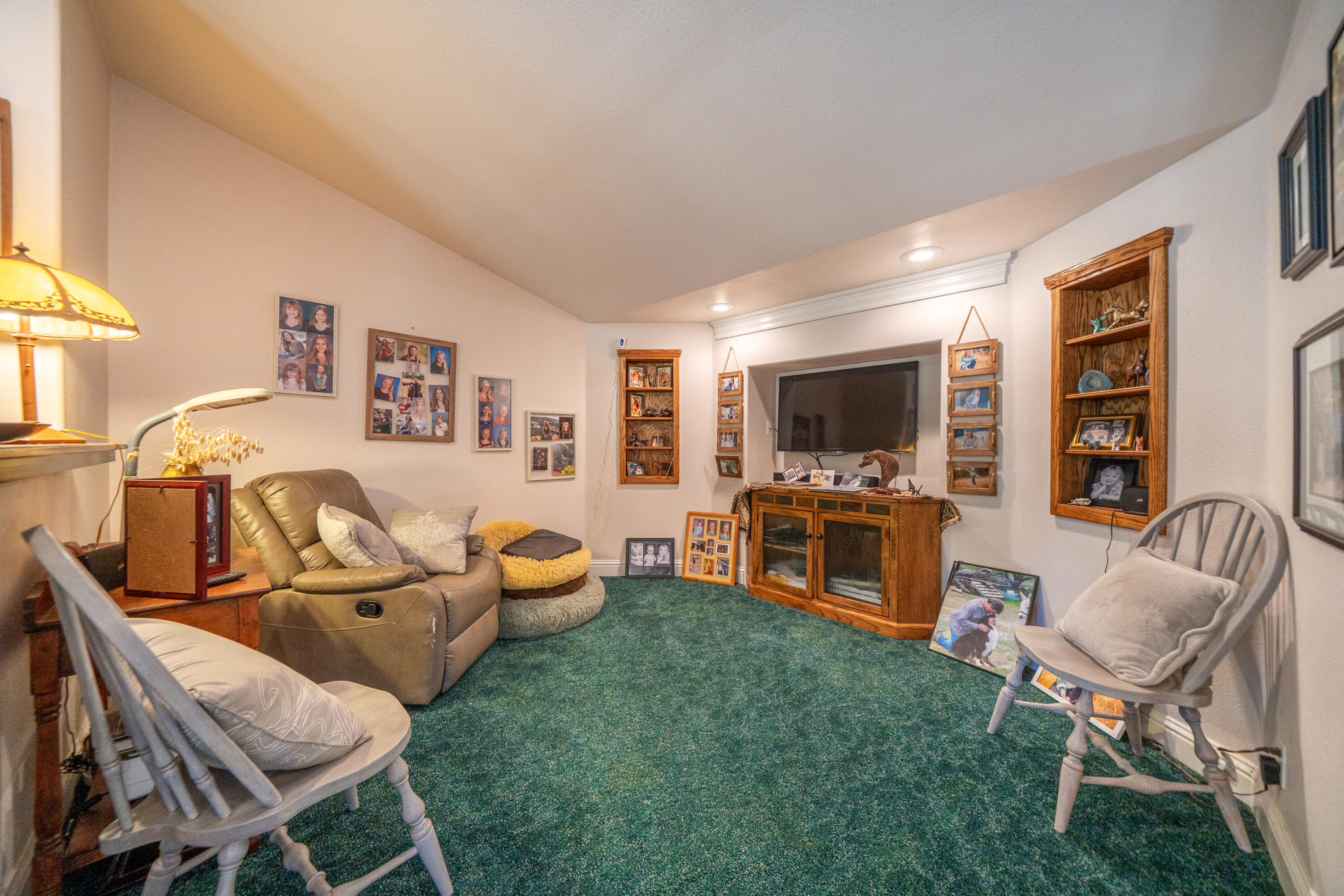 8533 Maynard Road Palo Cedro, CA 96073 - Photo 21 of 100 a living room with furniture and a flat screen tv