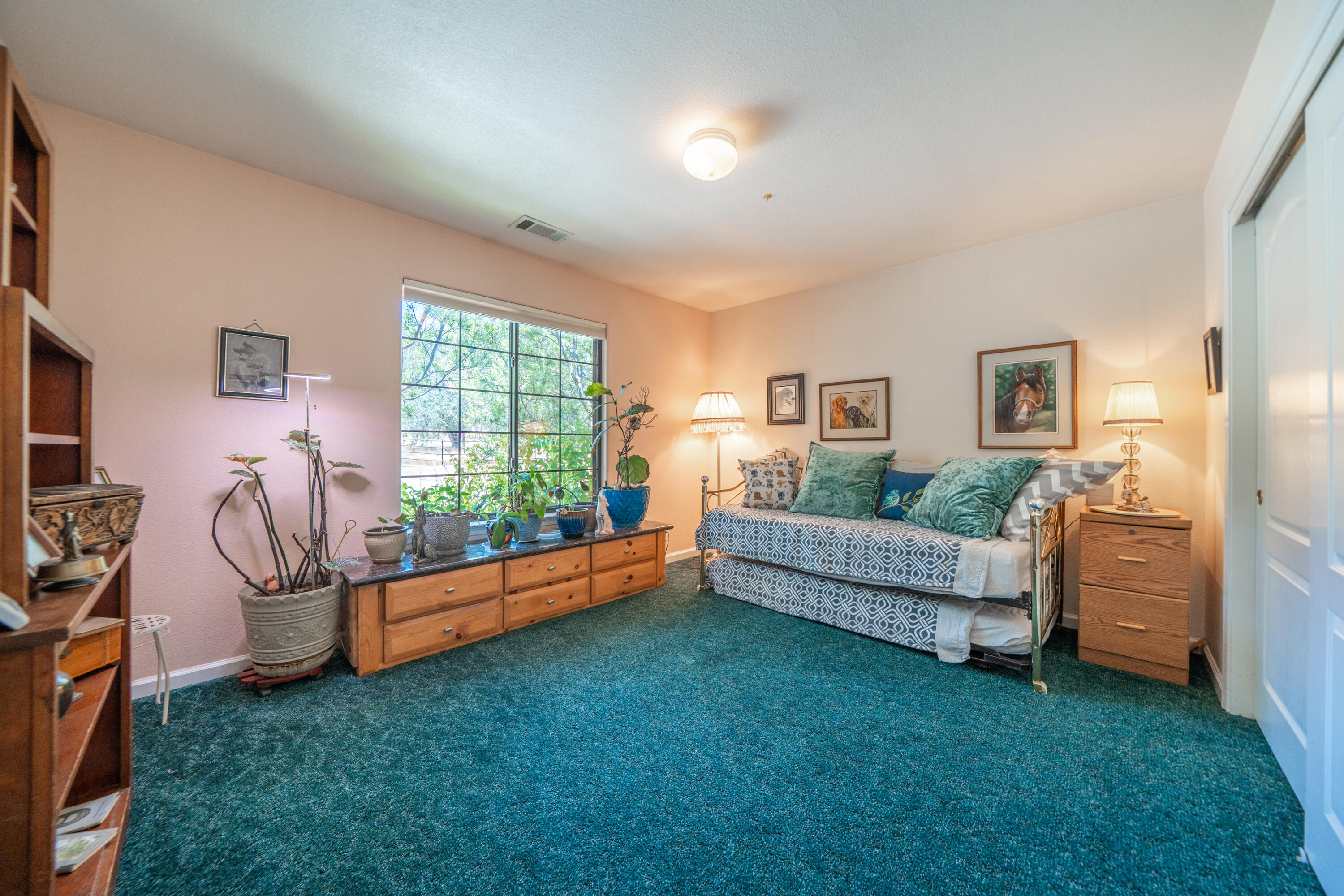 8533 Maynard Road Palo Cedro, CA 96073 - Photo 26 of 100 a living room with furniture and a flat screen tv