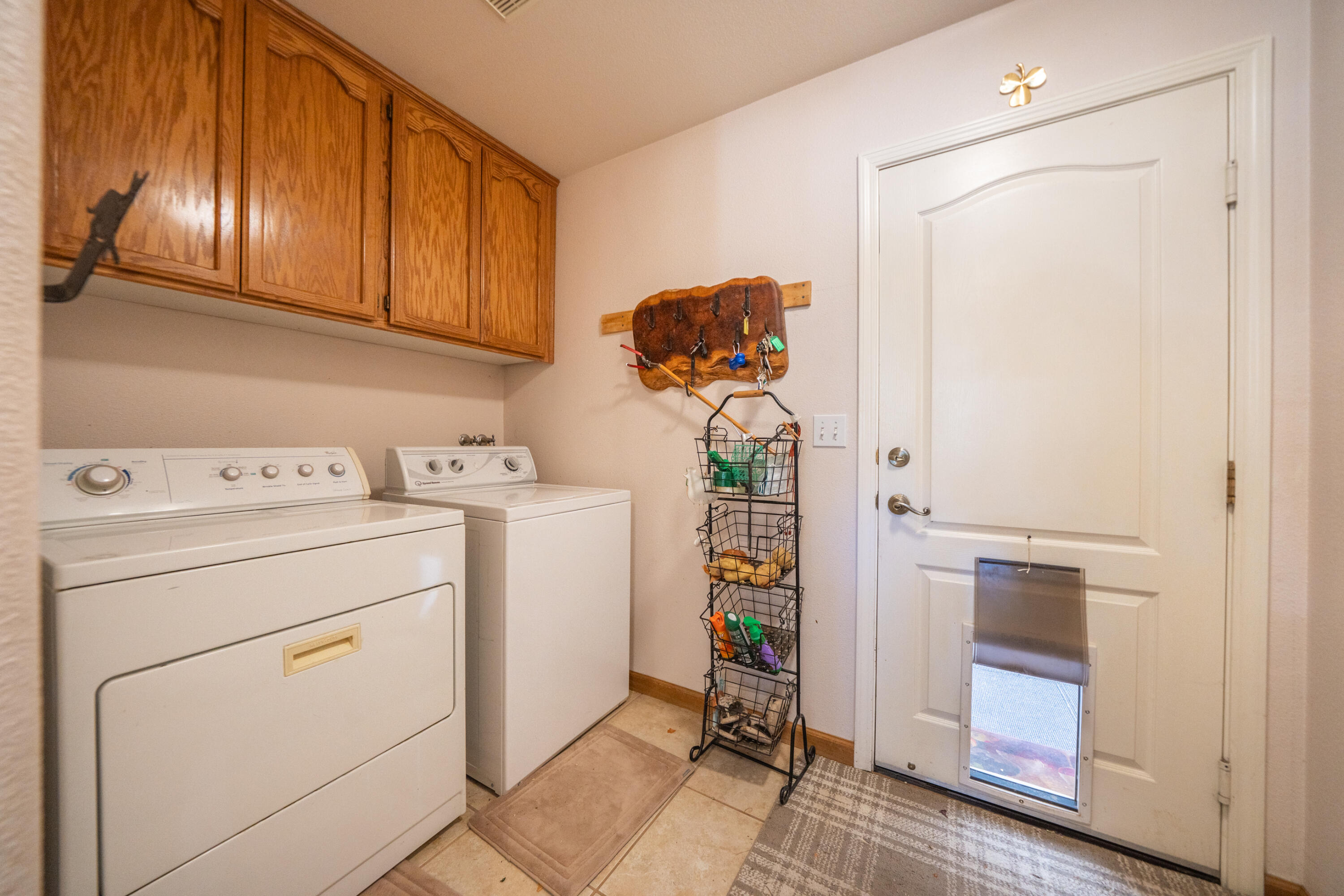 8533 Maynard Road Palo Cedro, CA 96073 - Photo 30 of 100 a view of storage and utility room with washer and dryer