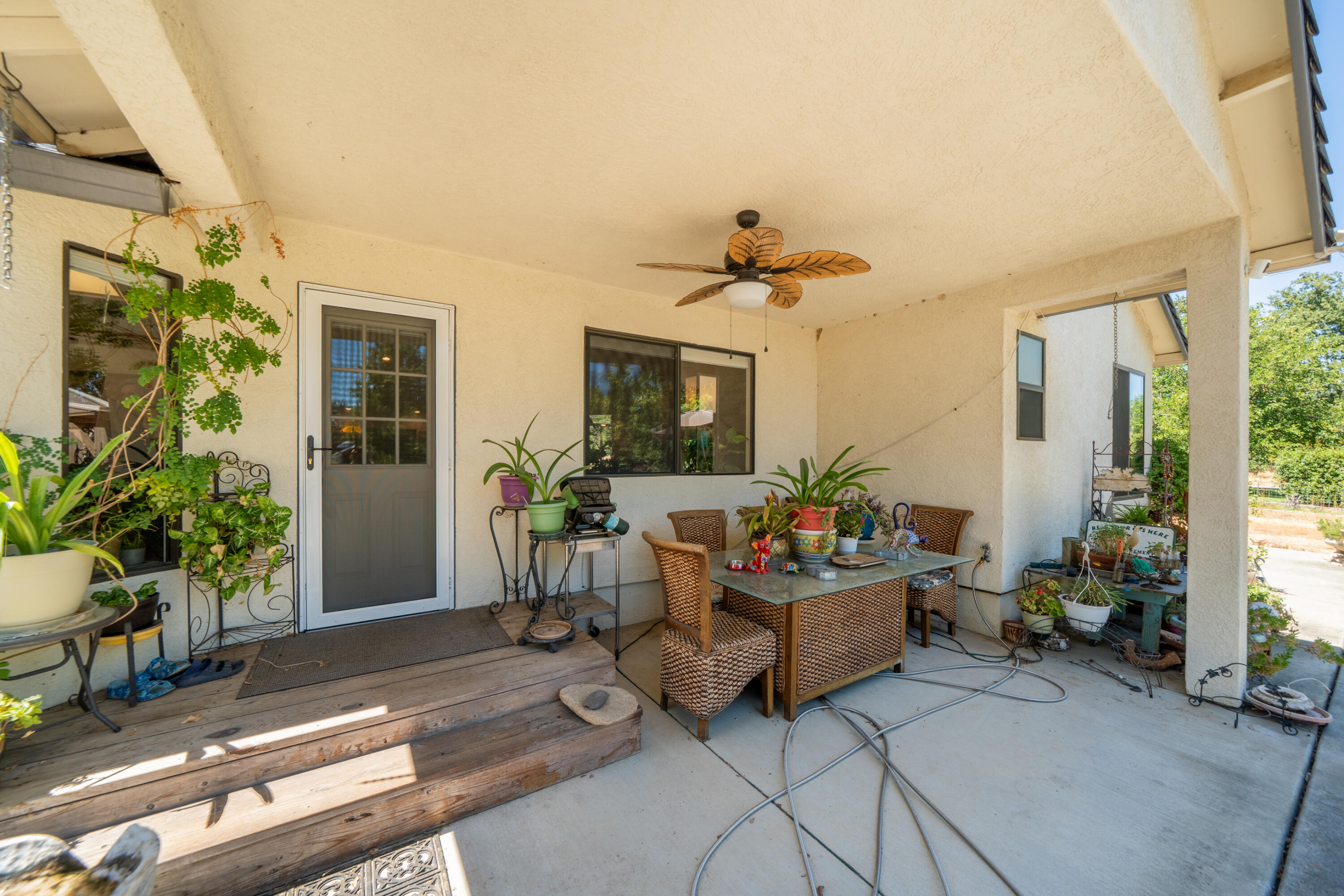 8533 Maynard Road Palo Cedro, CA 96073 - Photo 35 of 100 a living room with furniture and a potted plant