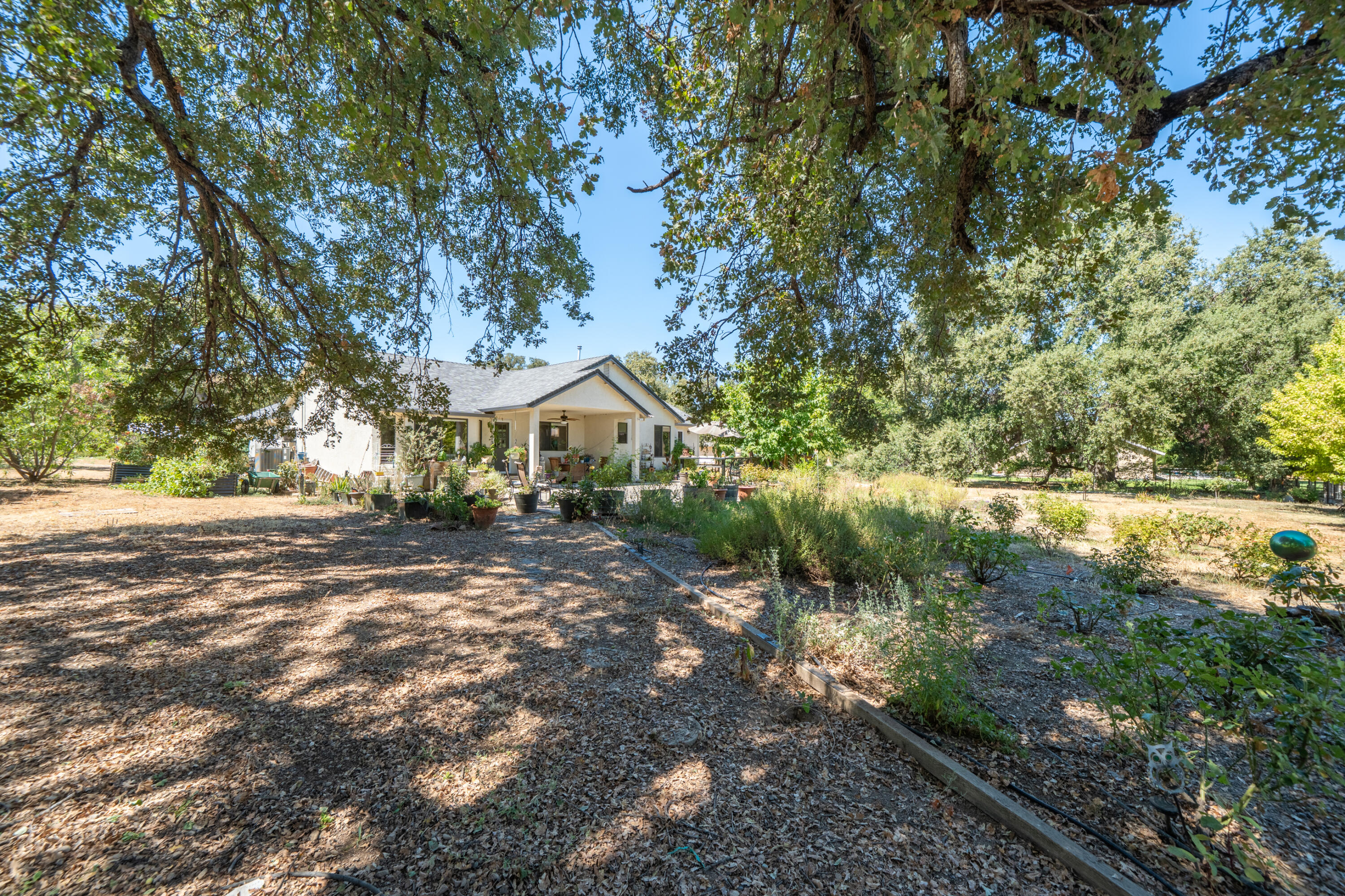 8533 Maynard Road Palo Cedro, CA 96073 - Photo 46 of 100 a front view of a house with a yard