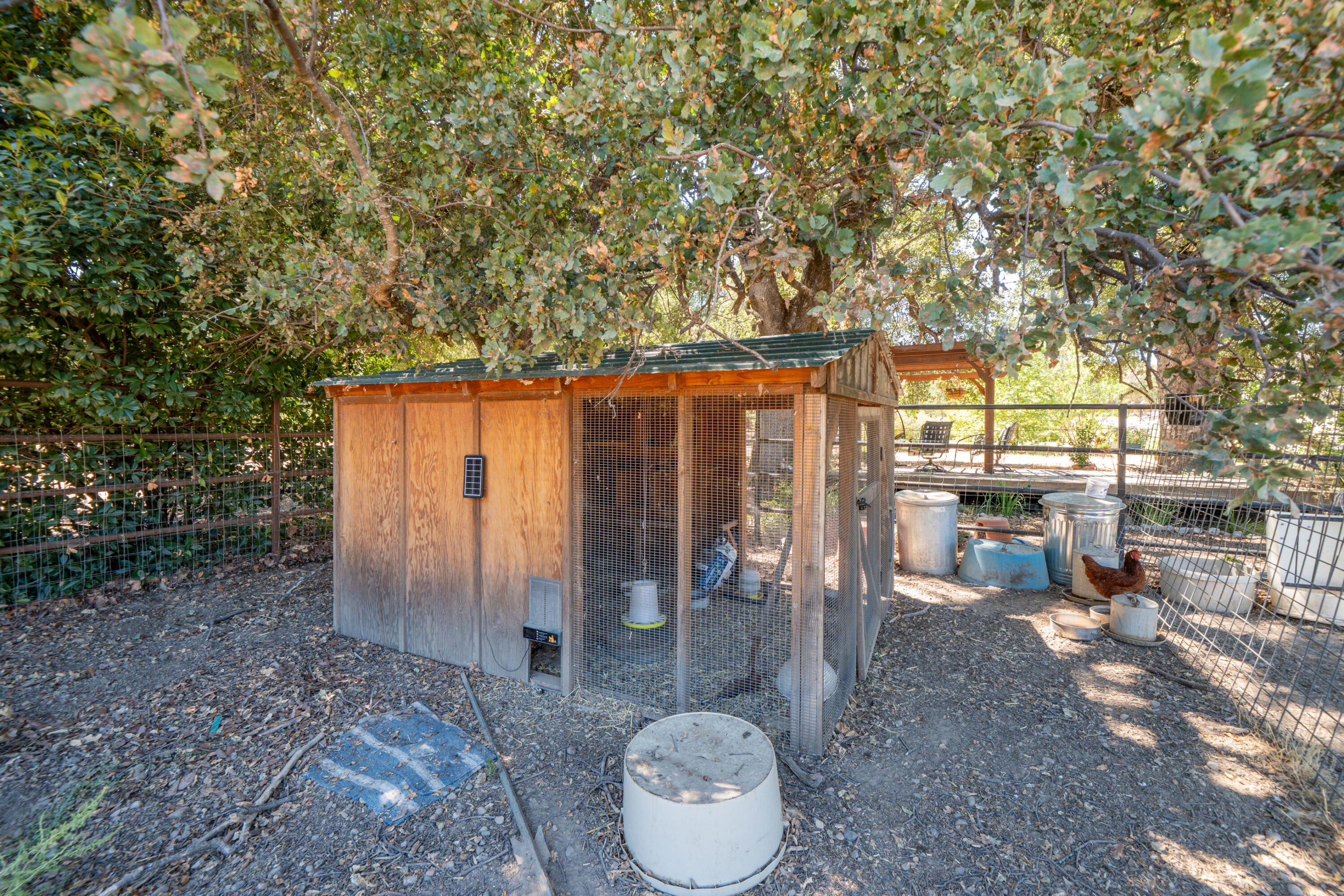 8533 Maynard Road Palo Cedro, CA 96073 - Photo 55 of 100 a backyard of a house with table and chairs