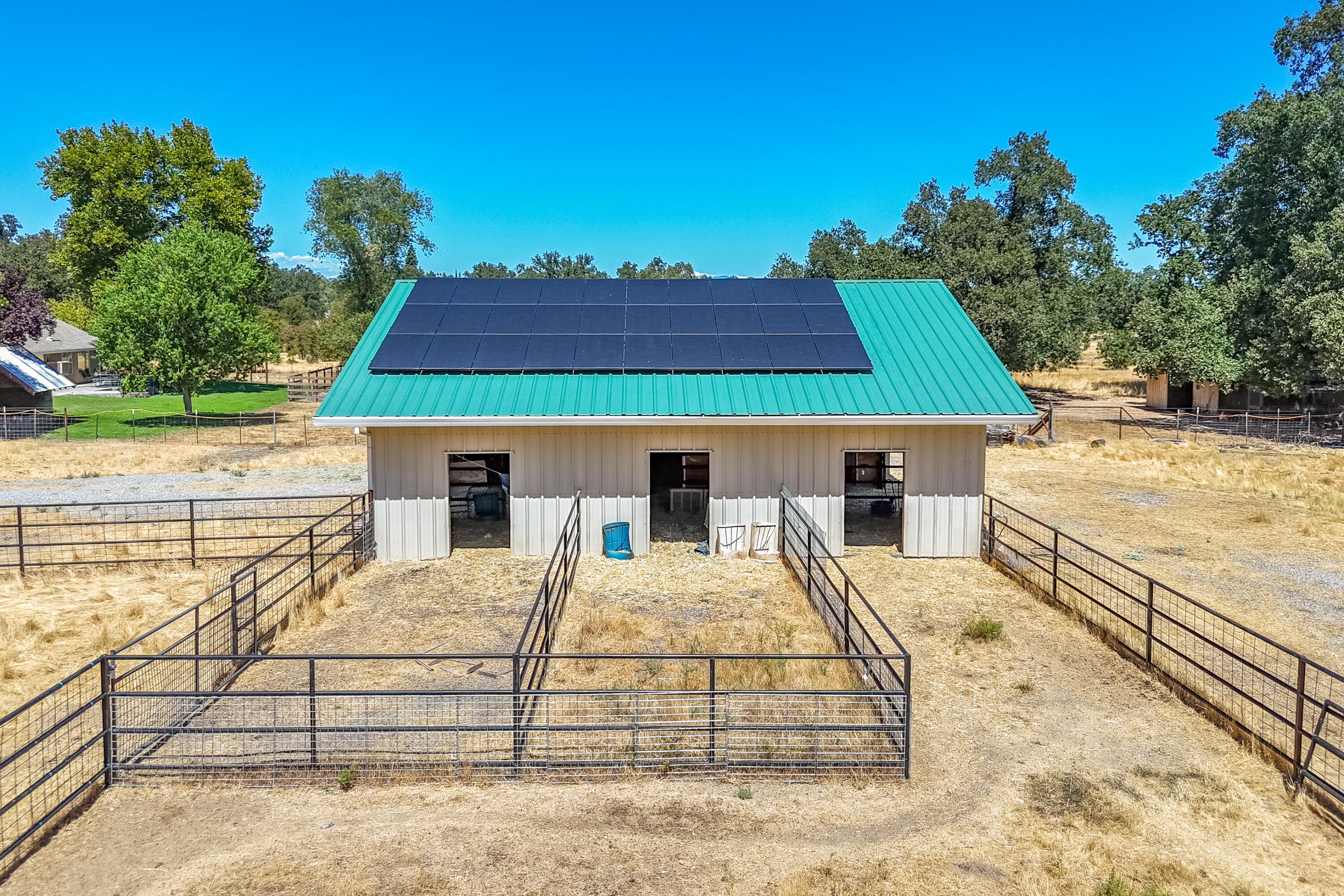 8533 Maynard Road Palo Cedro, CA 96073 - Photo 68 of 100 a view of a house with wooden deck and furniture