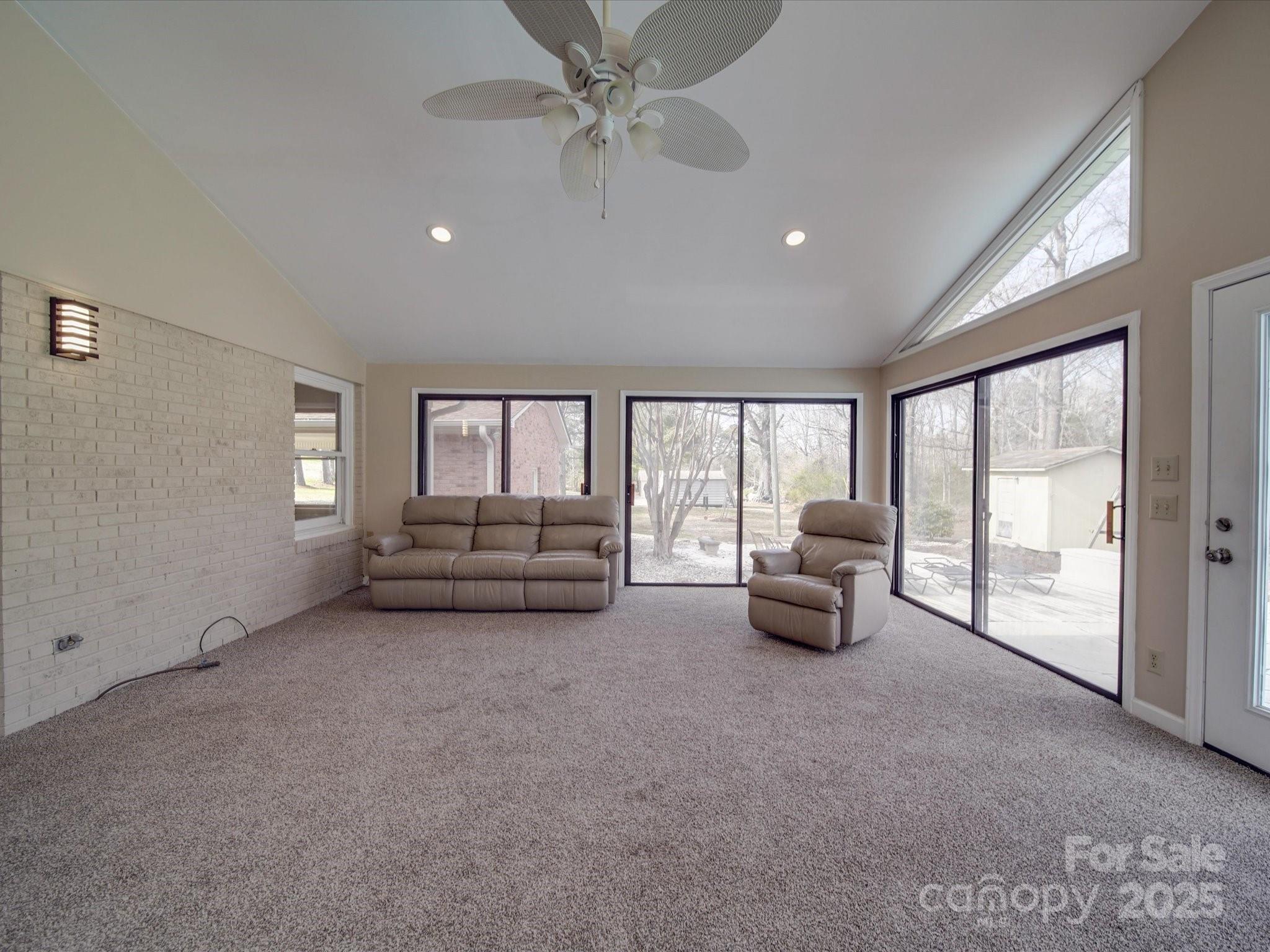 1515 Hasty Road Marshville, NC 28103 - Photo 30 of 40 a living room with furniture and a ceiling fan