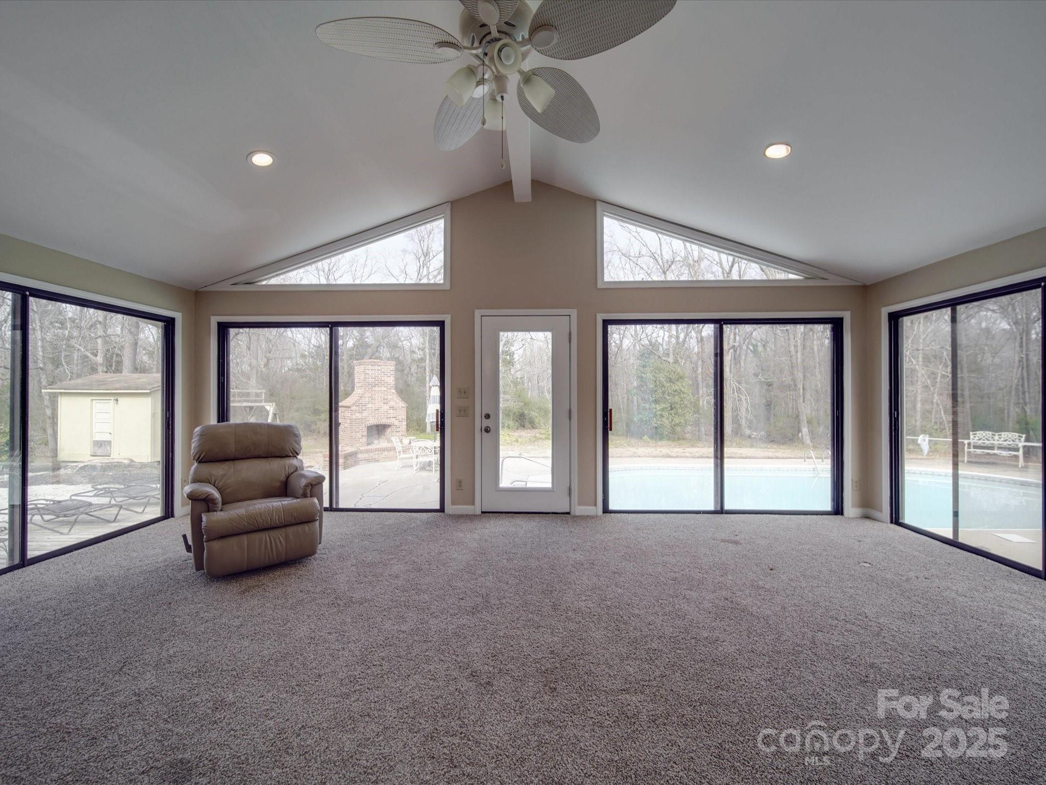 1515 Hasty Road Marshville, NC 28103 - Photo 31 of 40 a living room with furniture and a large window