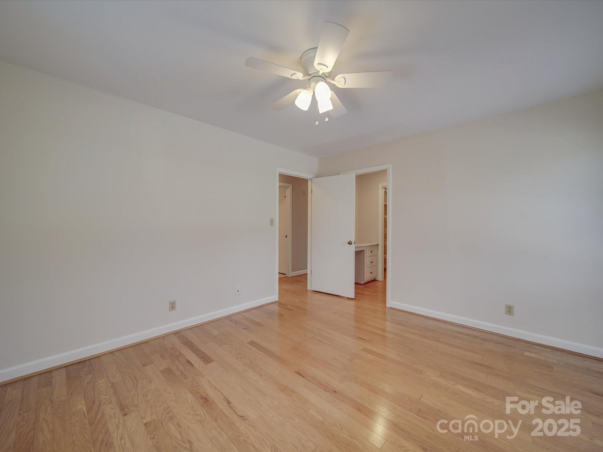 1515 Hasty Road Marshville, NC 28103 - Photo 36 of 40 a view of an empty room with a fan