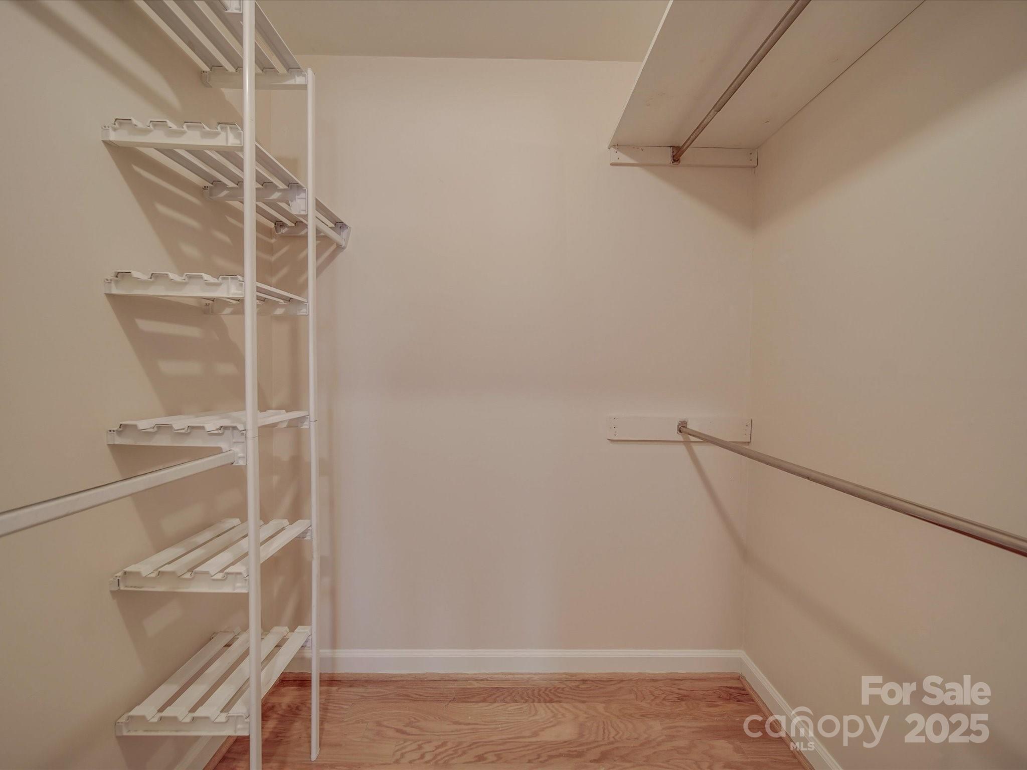 1515 Hasty Road Marshville, NC 28103 - Photo 38 of 40 a view of walk in closet with empty racks