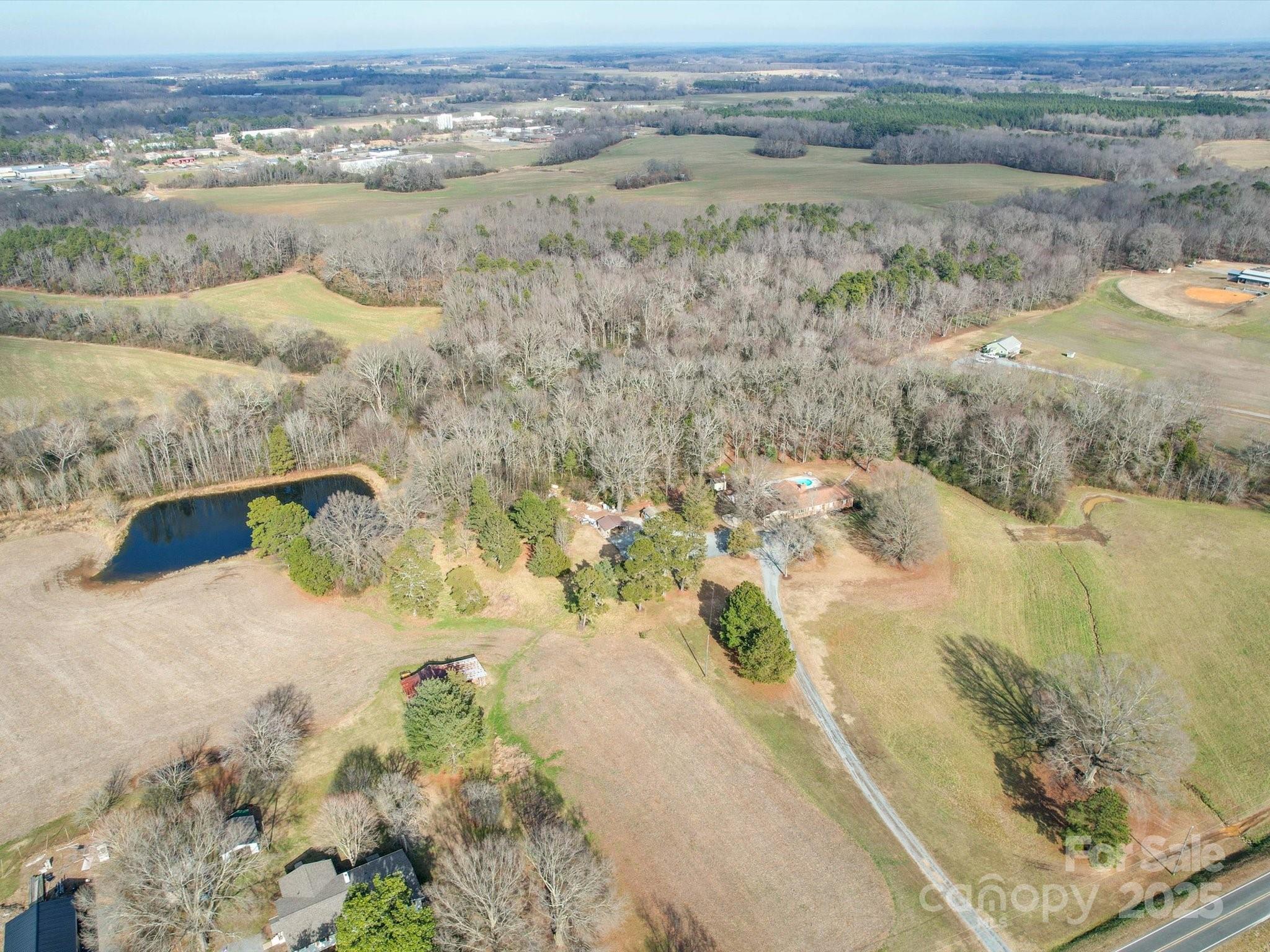 1515 Hasty Road Marshville, NC 28103 - Photo 5 of 40 a view of a lake with a mountain