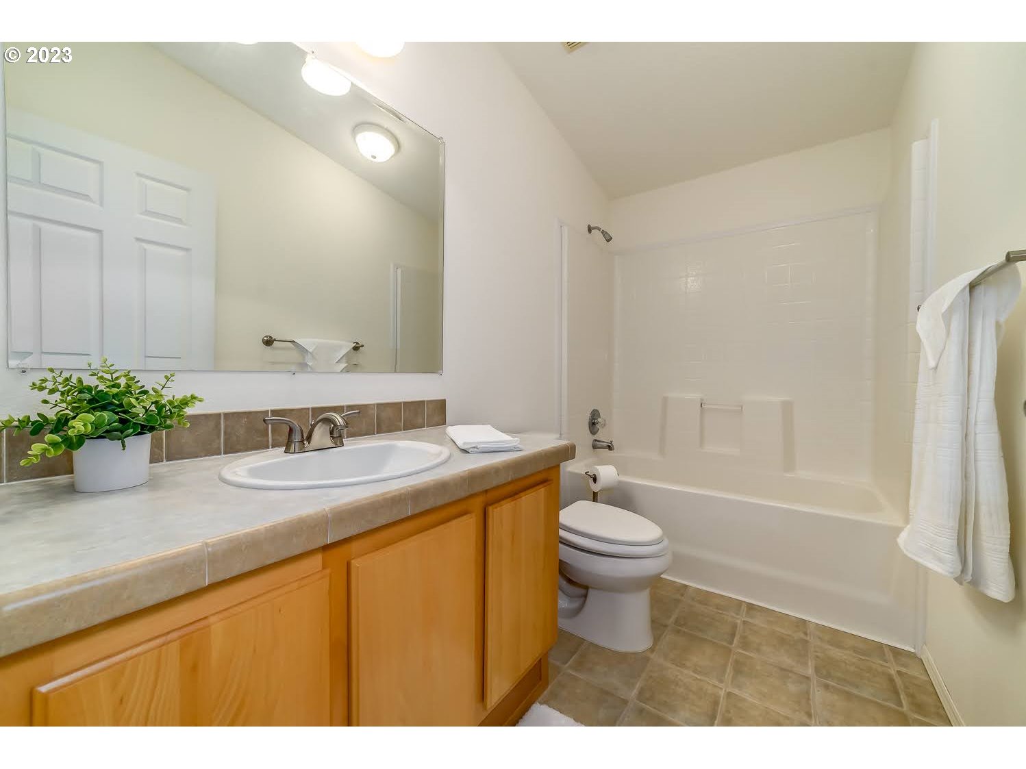 3220 Crescent Avenue, Unit 42 Eugene, OR 97408 - Photo 20 of 31 a bathroom with a sink a toilet and shower
