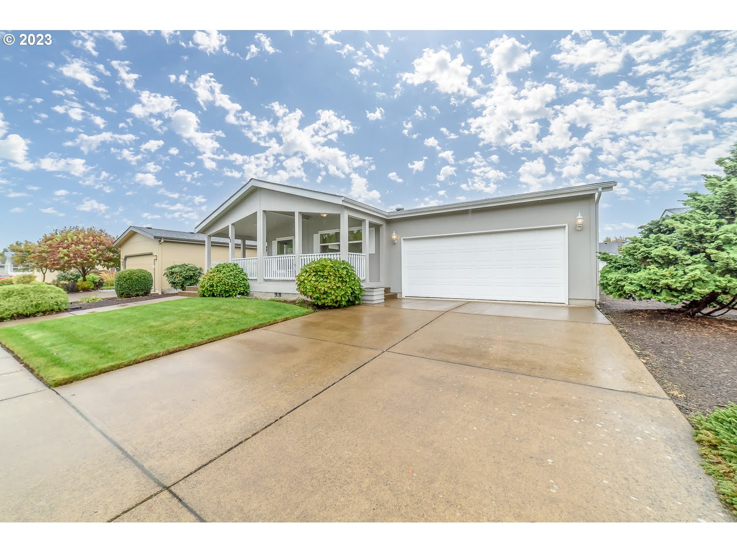 3220 Crescent Avenue, Unit 42 Eugene, OR 97408 - Photo 3 of 31 a view of a house with a yard and potted plants