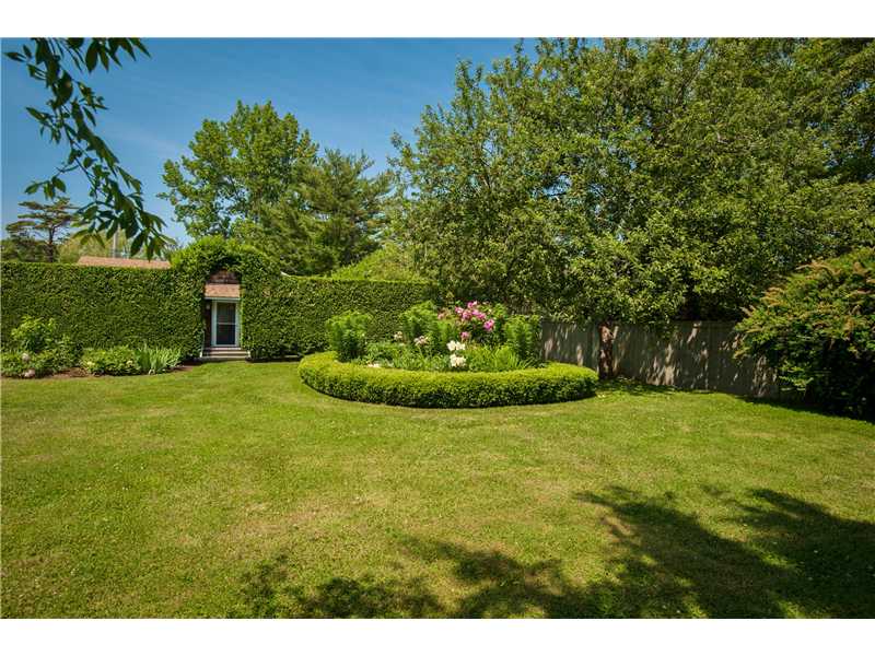 44 Foster Cove Road Westerly, RI 02891 - Photo 5 of 25 Yard/Garden. Guest House seen through garden hedge