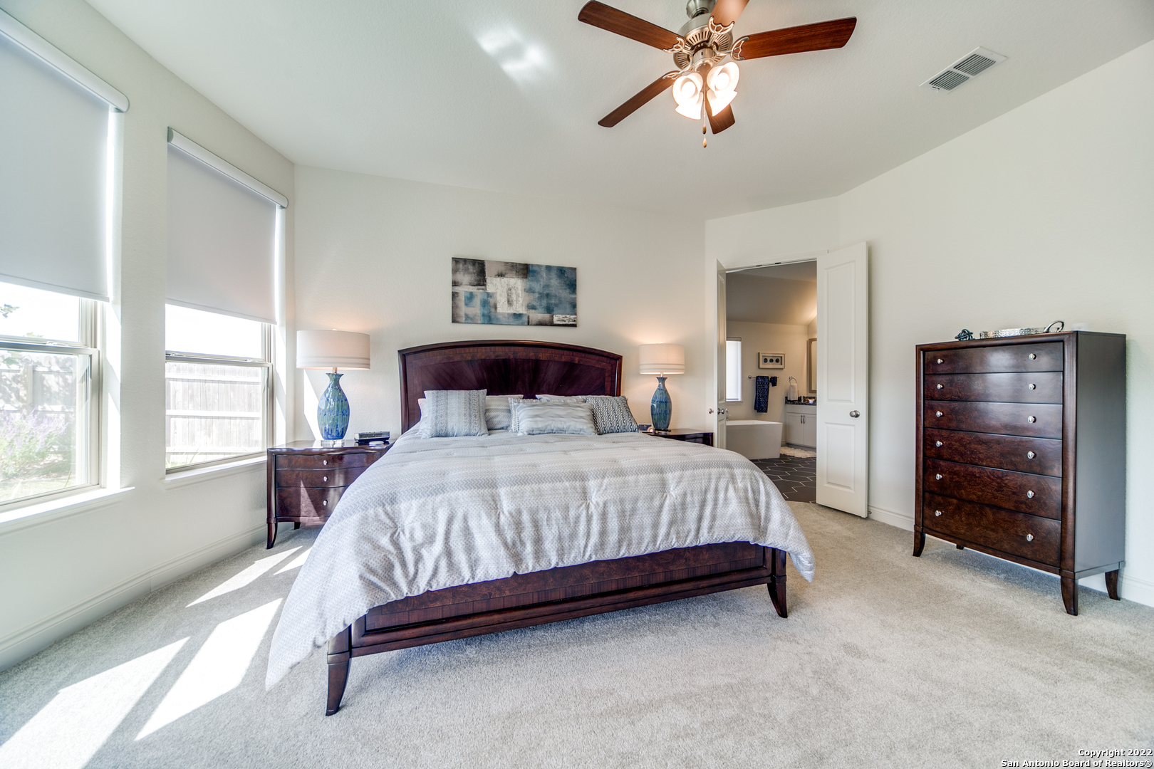 29734 Elkhorn Ridge Boerne, TX 78015 - Photo 17 of 25 a bedroom with a bed and a window