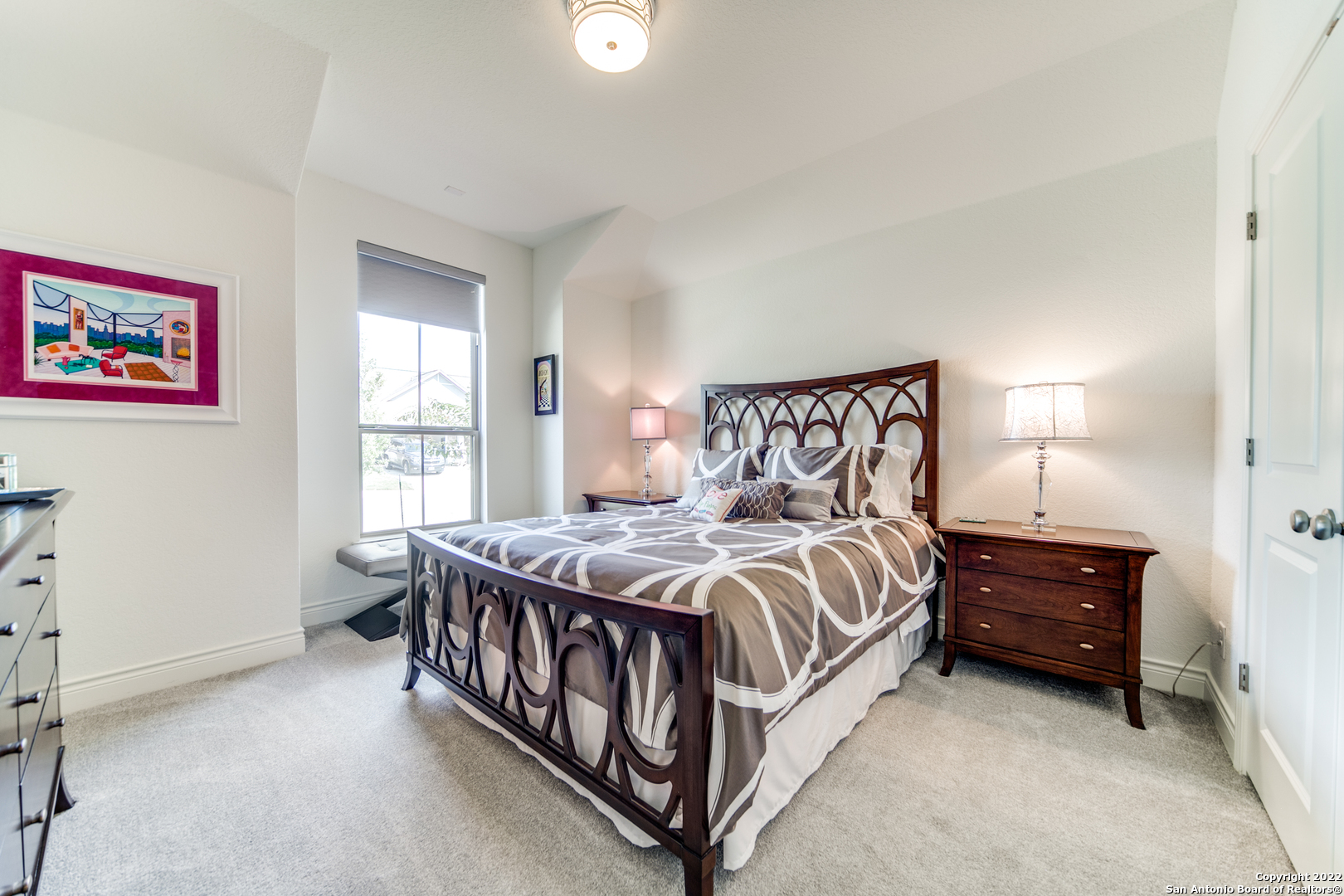 29734 Elkhorn Ridge Boerne, TX 78015 - Photo 18 of 25 a bedroom with a bed and a window