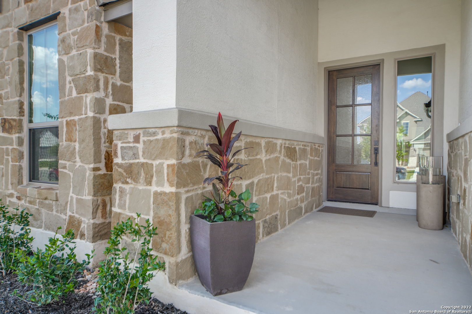 29734 Elkhorn Ridge Boerne, TX 78015 - Photo 2 of 25 a view of a potted plant in front of a building