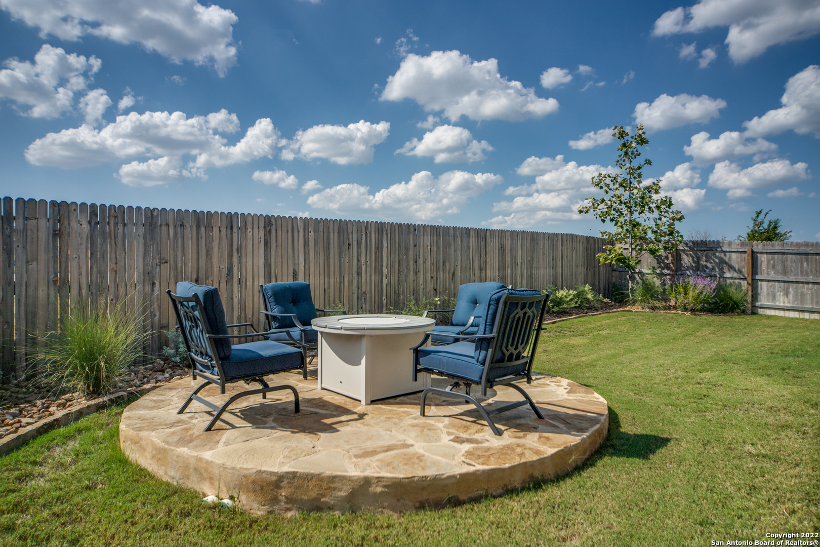 29734 Elkhorn Ridge Boerne, TX 78015 - Photo 24 of 25 a view of a chair and table in backyard