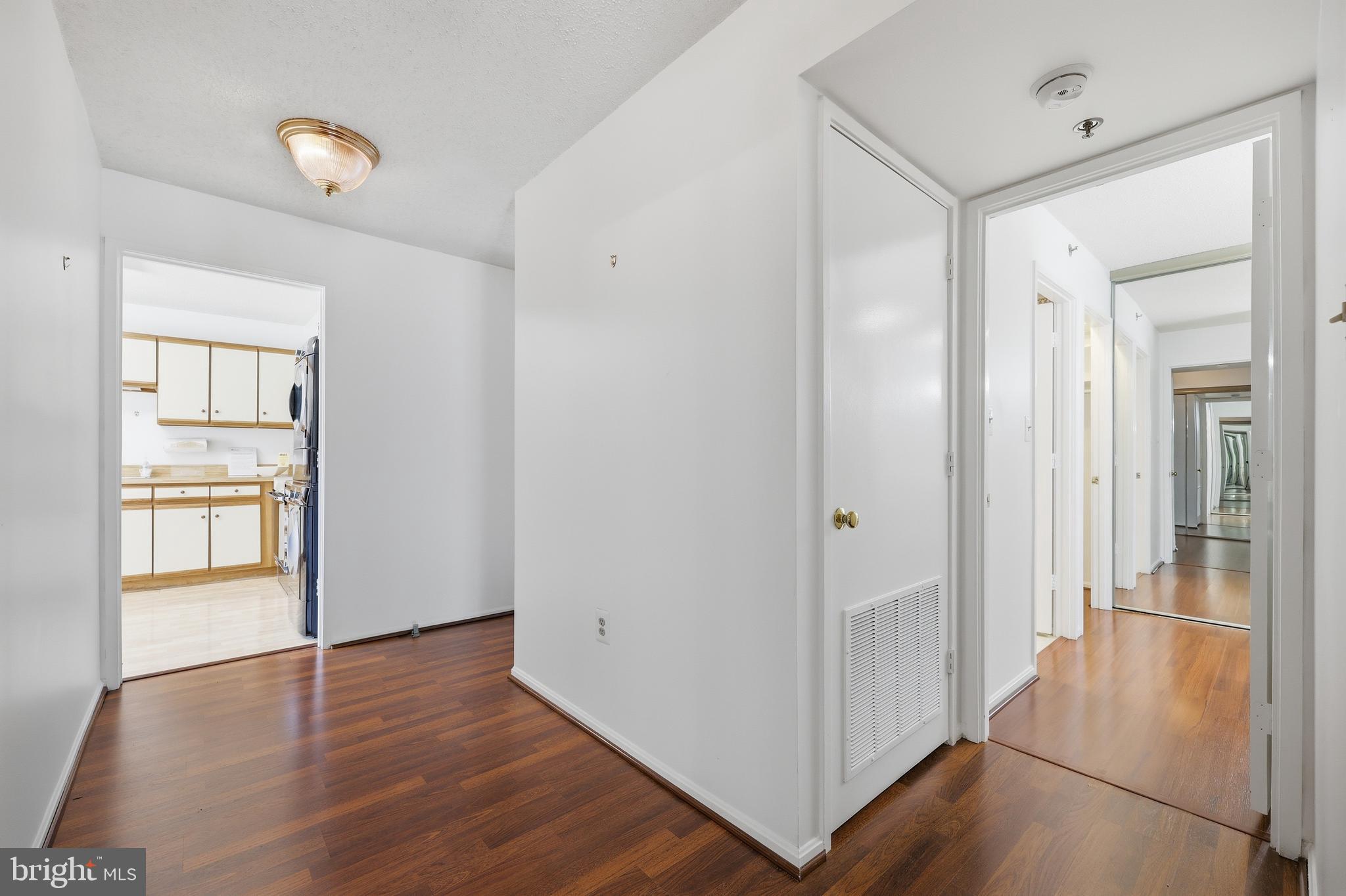 3330 North Leisure World Boulevard, Unit 5109 Silver Spring, MD 20906 - Photo 6 of 44 Hallway from entrance : Kitchen on the right