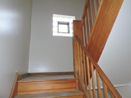 912 Madison Street Maywood, IL 60153 - Photo 12 of 23 a view of an entryway with staircase