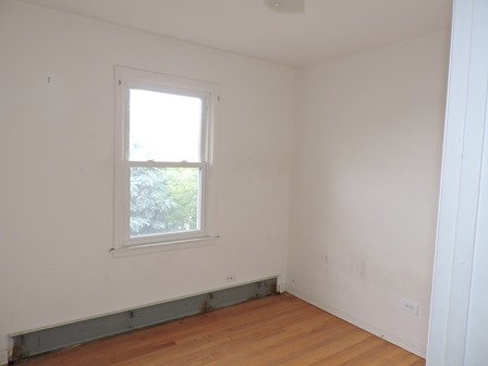 912 Madison Street Maywood, IL 60153 - Photo 14 of 23 an empty room with a window