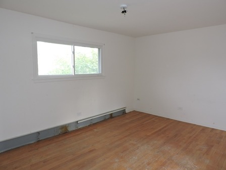 912 Madison Street Maywood, IL 60153 - Photo 18 of 23 an empty room with a window