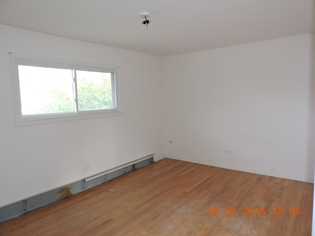 912 Madison Street Maywood, IL 60153 - Photo 19 of 23 an empty room with a window