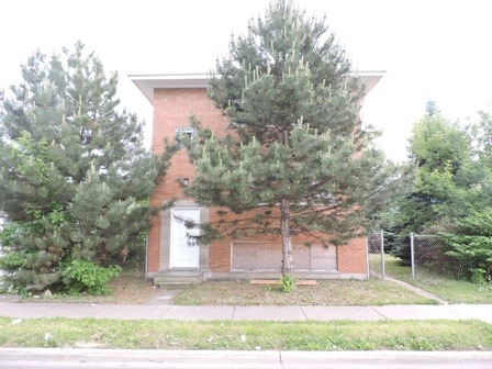 912 Madison Street Maywood, IL 60153 - Photo 23 of 23 a front view of a house with a yard