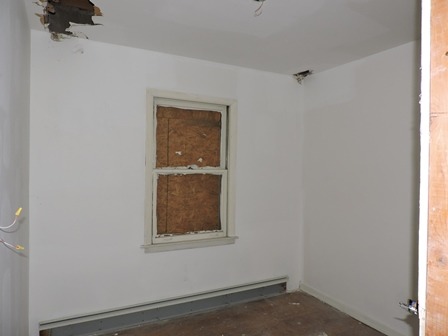 912 Madison Street Maywood, IL 60153 - Photo 9 of 23 an empty room with a window