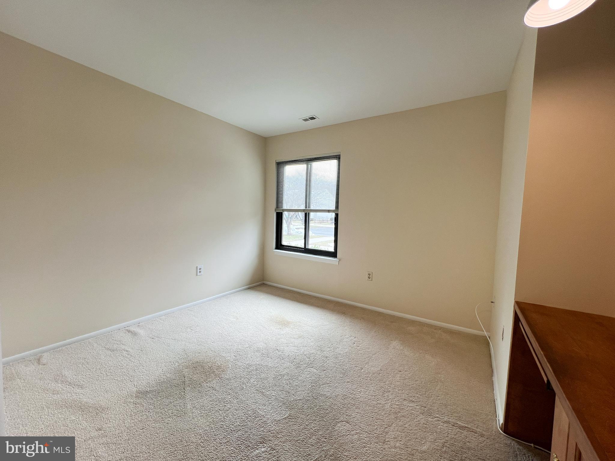 3163 Adderley Court Silver Spring, MD 20906 - Photo 19 of 26 an empty room with windows