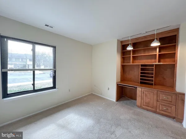 a room with furniture and windows