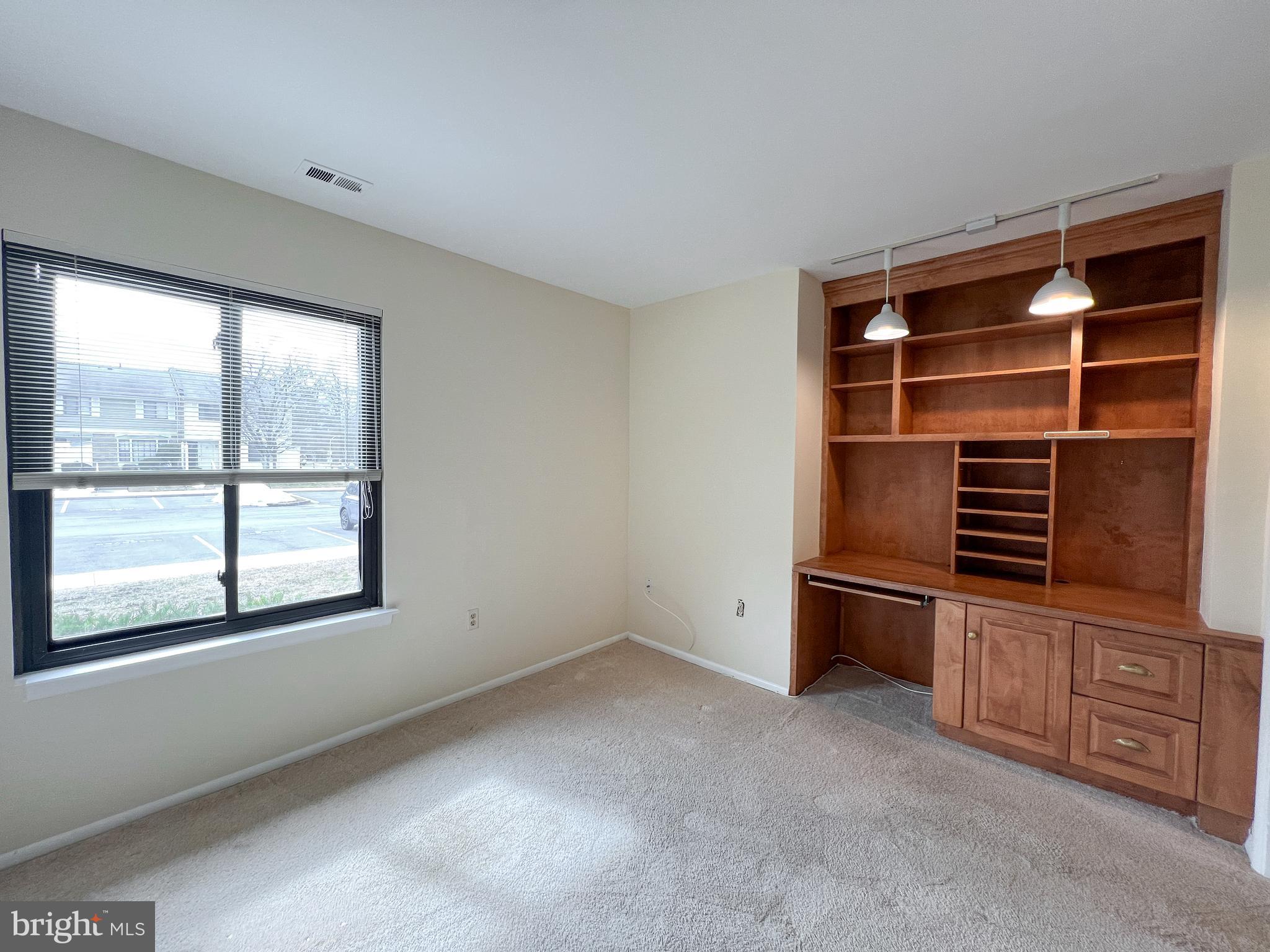 3163 Adderley Court Silver Spring, MD 20906 - Photo 20 of 26 a room with furniture and windows