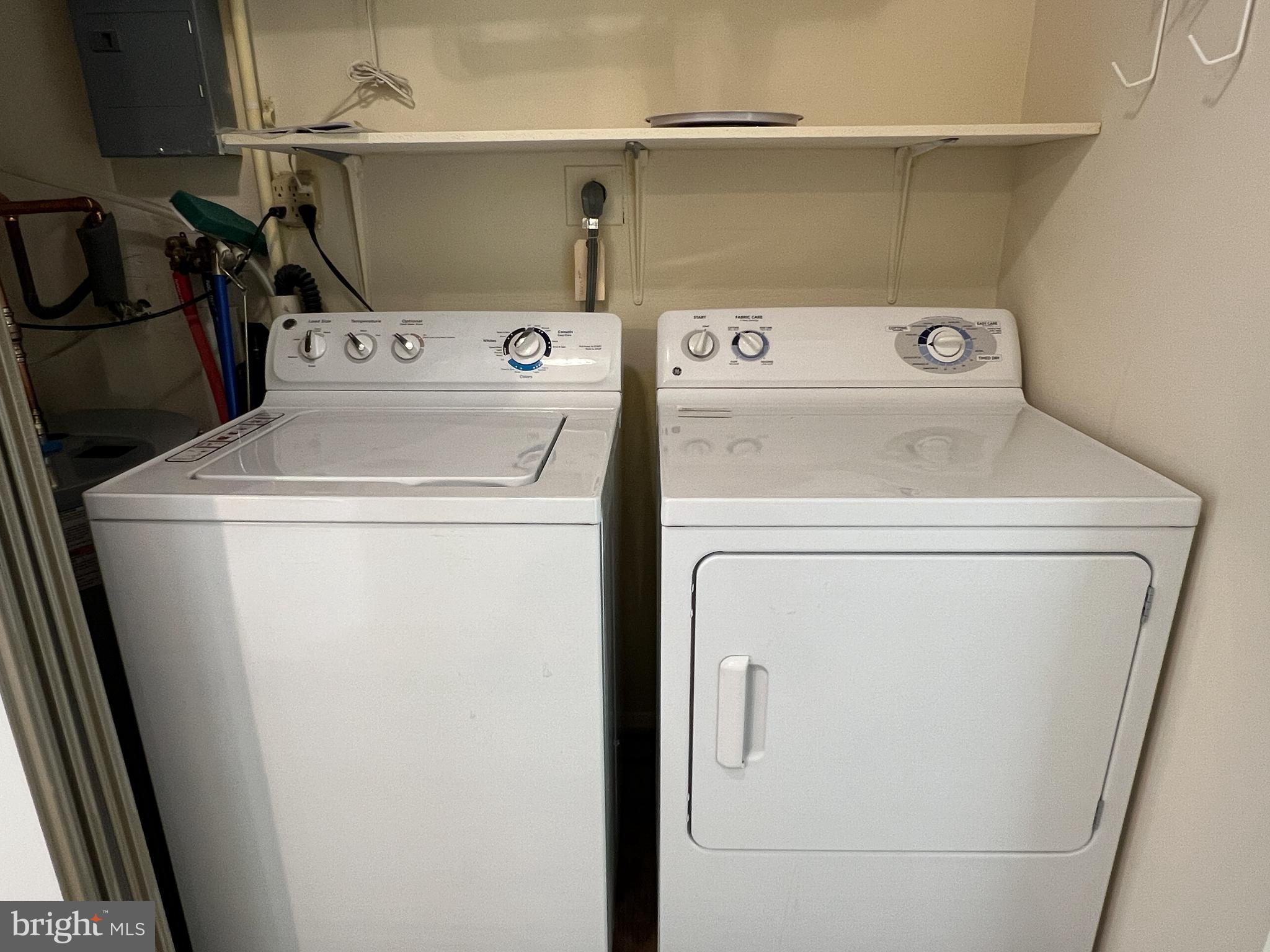 3163 Adderley Court Silver Spring, MD 20906 - Photo 21 of 26 a utility room with dryer and washer