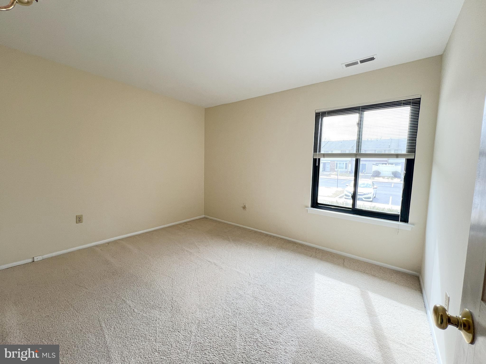3163 Adderley Court Silver Spring, MD 20906 - Photo 22 of 26 an empty room with a window