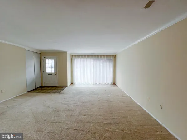 a view of empty room with window