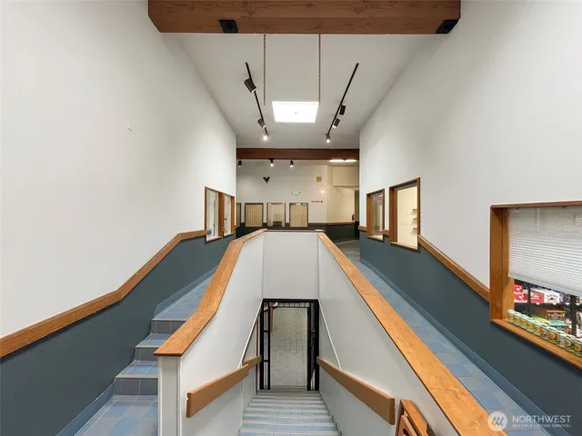 a view of a living room and entryway