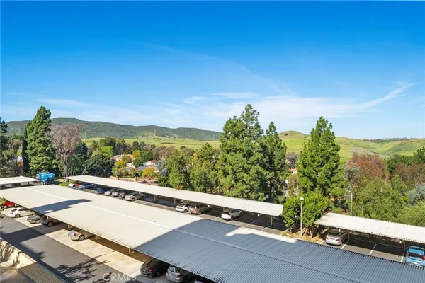 a view of a balcony with mountain view