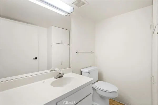 a bathroom with a sink and a toilet