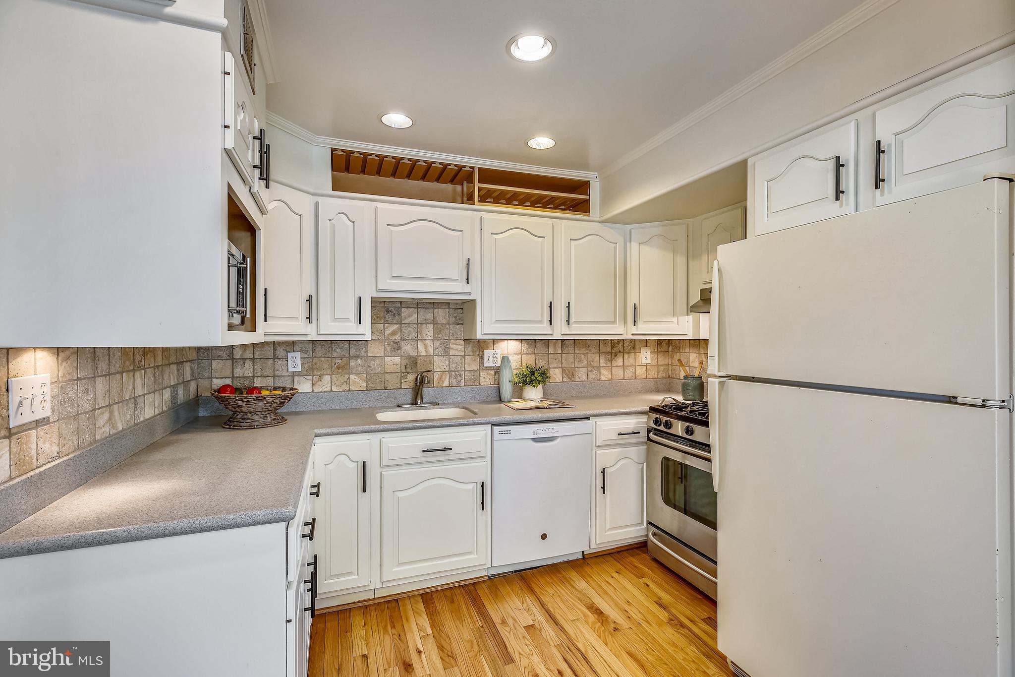 2011 Lansdowne Way Silver Spring, MD 20910 - Photo 17 of 50 Kitchen with white cabinetry