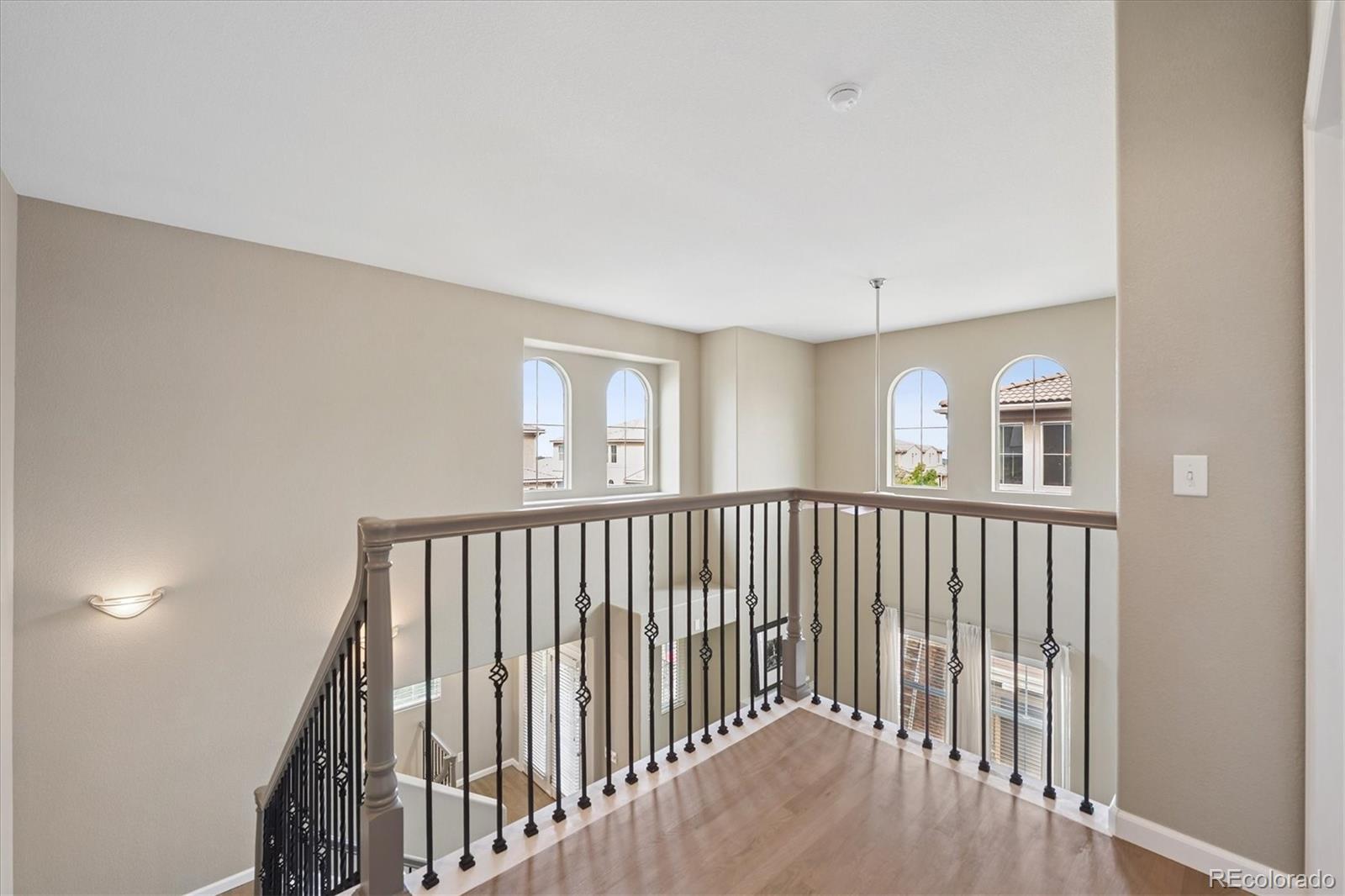 3350 Cascina Circle, Unit D Highlands Ranch, CO 80126 - Photo 19 of 40 a view of staircase with rug floor