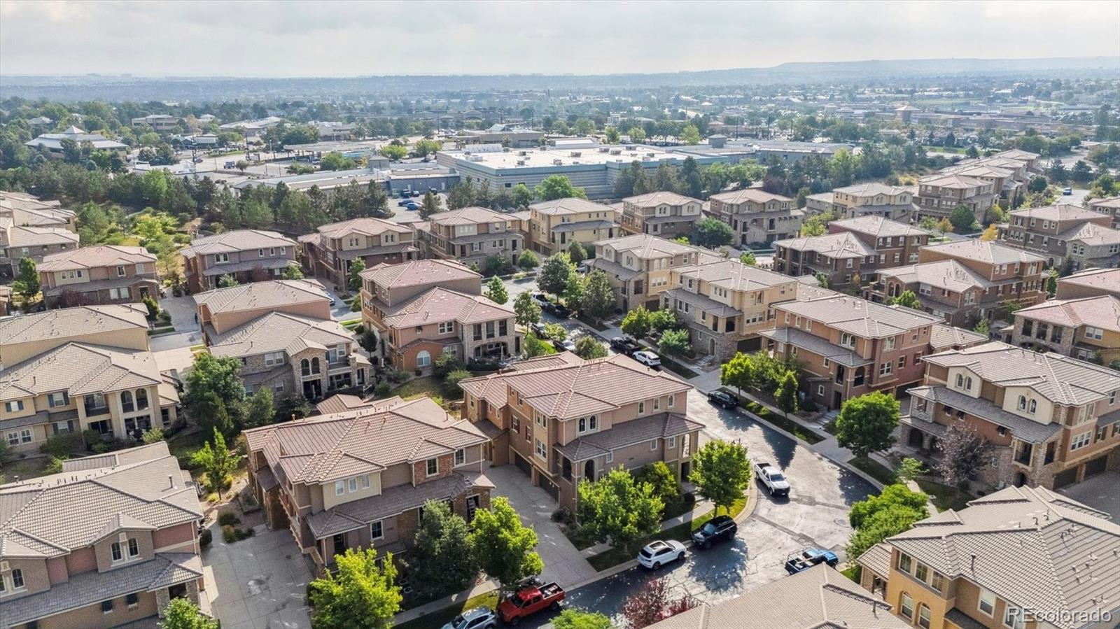 3350 Cascina Circle, Unit D Highlands Ranch, CO 80126 - Photo 32 of 40 an aerial view of residential houses with outdoor space