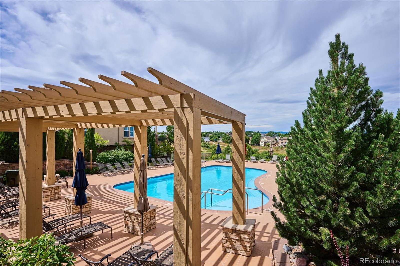 3350 Cascina Circle, Unit D Highlands Ranch, CO 80126 - Photo 36 of 40 a view of an chairs and table in the balcony