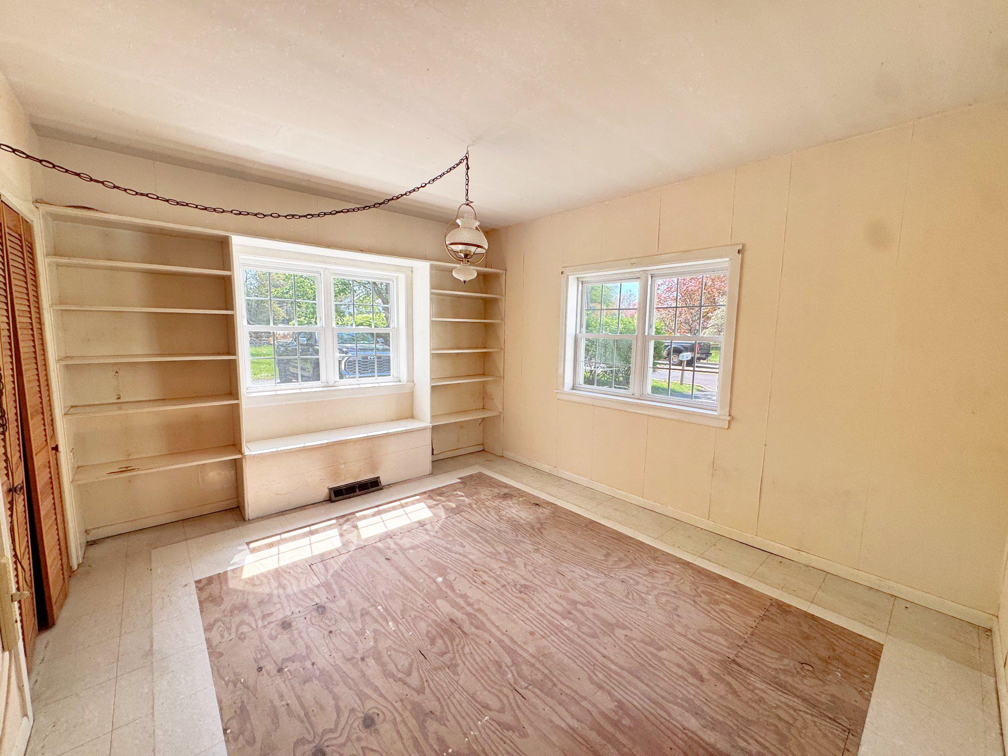 1545 Almshouse Road Jamison, PA 18929 - Photo 25 of 30 wooden floor in an empty room with a window