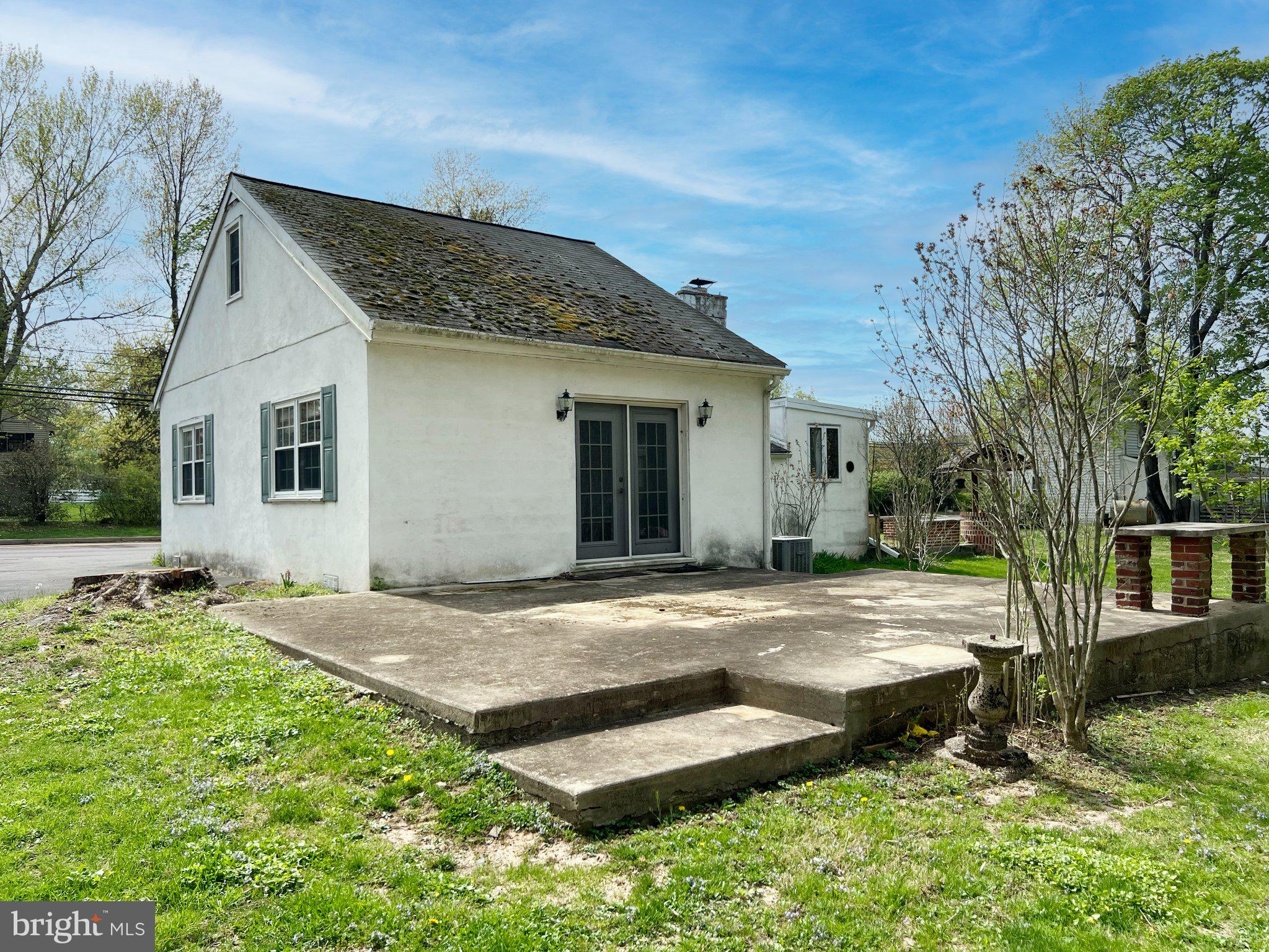 1545 Almshouse Road Jamison, PA 18929 - Photo 7 of 30 a view of a house with backyard and a tree
