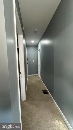 a bed sitting in a room