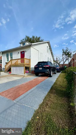 a car parked in front of a house