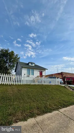 a view of a house with a big yard