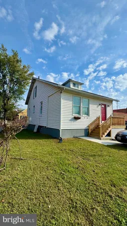a house view with a garden space