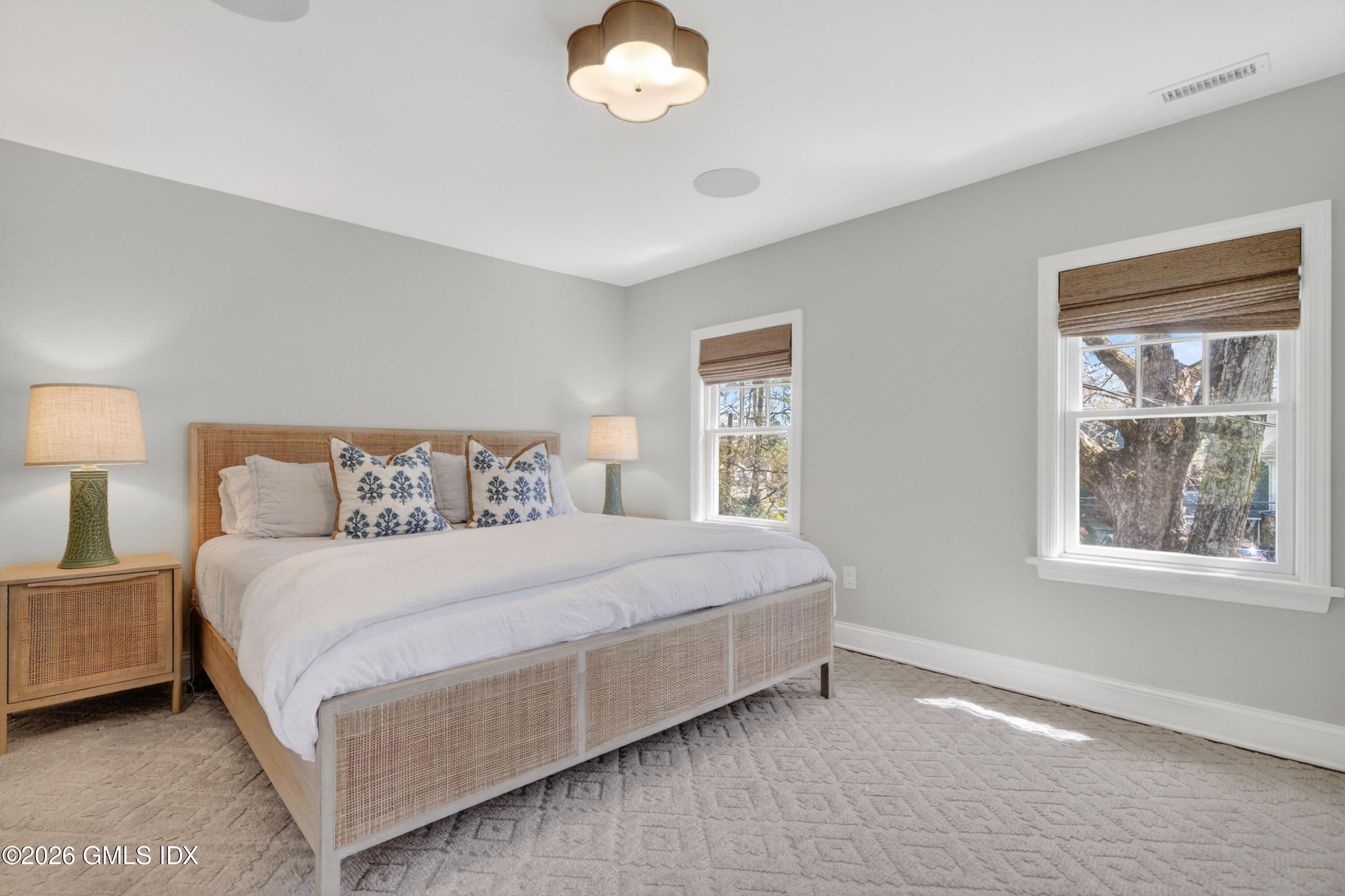 20 Ridge Road Cos Cob, CT 06807 - Photo 21 of 36 a bedroom with a bed and a window