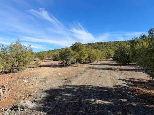 0 Whiskey Ridge Road Prescott, AZ 86305 - Photo 27 of 33 a view of a yard with mountains in the background