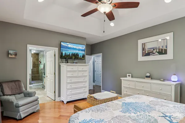 a bedroom with a bed and furniture