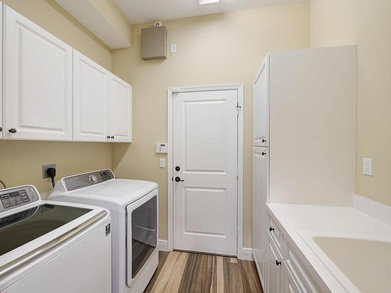 2663 Southwest Windship Way Stuart, FL 34997 - Photo 22 of 28 Laundry Room